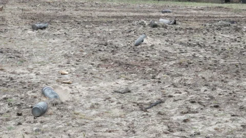 Unexploded shells on the ground Stock-Footage 195807688