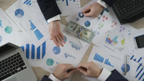 Unfair official demanding kickback money from businessman, bribery, top view Stock Footage