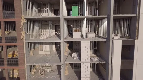 Unfinished building with construction in empty rooms Stock Footage 157665391