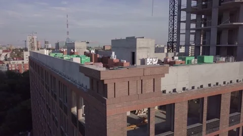 Unfinished building corner with huge undefined windows Stock Footage 157665417
