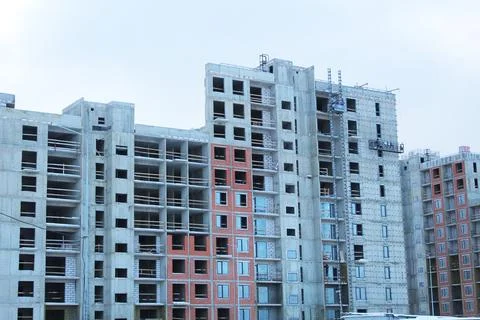 An unfinished building. Problems of unfinished construction in the city Stock Photos