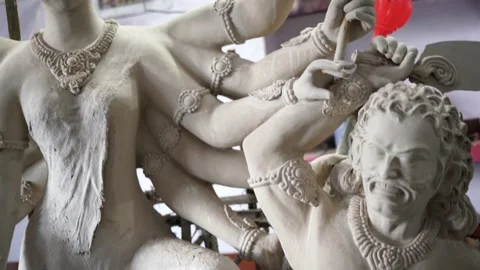 An Unfinished clay idol of Goddess Devi Durga, for upcoming Durga Puja Stock Footage 229726515