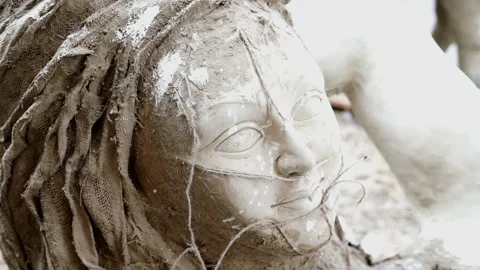 An Unfinished clay idol of Goddess Devi Durga, for upcoming Durga Puja Stock Footage 229729494