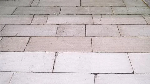 Unfinished concrete block wall with a rectangular pattern under construct Stock Photos