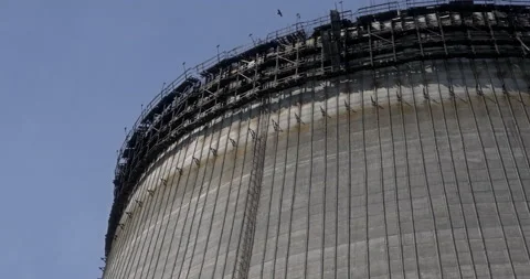 Unfinished cooling tower in Chernobyl Nuclear Power Plant Close-up Stock Footage 200848639