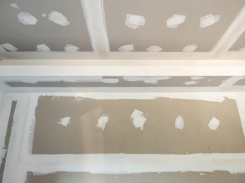 Unfinished Drywall Ceiling and Wall with Joint Compound Stock Photos