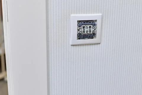 Unfinished electrical switch installation on wall Stock Photos