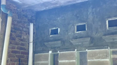 Unfinished house building structure with brick wall and concrete 库存影片 340485693
