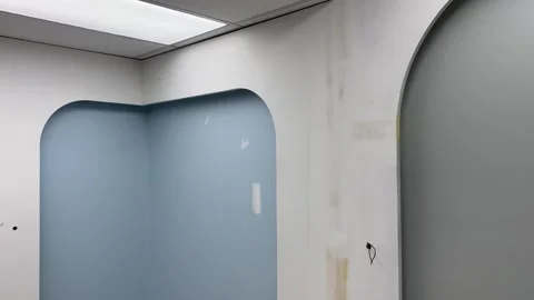 Unfinished interior painted blue wall. Architecture and home design concept Stock Footage 249730219