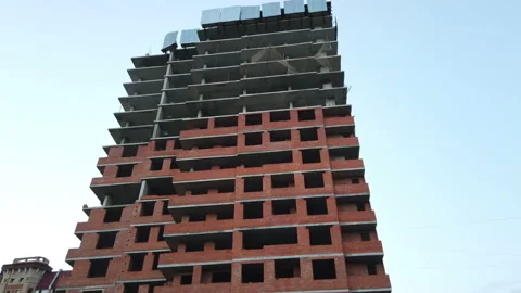 Unfinished monolithic frame of the building. dangerous place Stock Footage 158309516