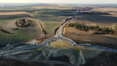 Unfinished ring on the road, with traffic. Road construction Stock Footage 168989727