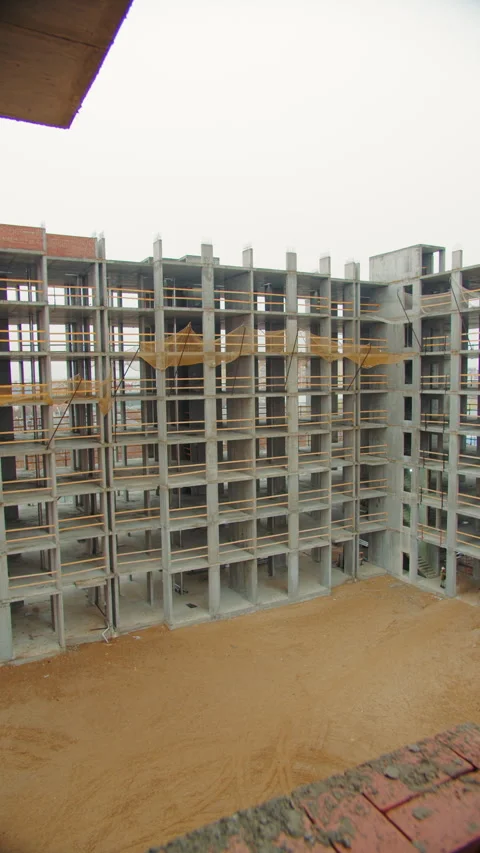 Unfinished Room with Large Windows Overlooking Construction Stock Footage 296755970