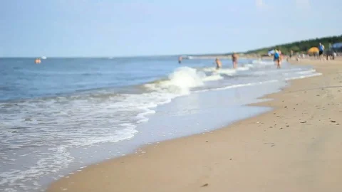 Unfocused beach with humans Stock Footage 99119467