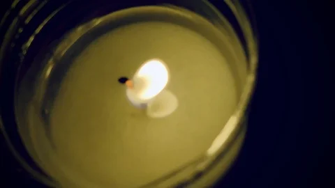 Unfocused candle flame closeup Stock Footage 122516715