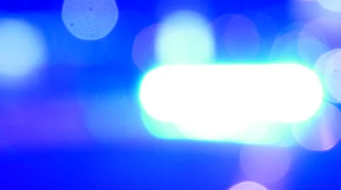 Unfocused close up view to police cruiser flashing siren lights Stock Footage 46012853