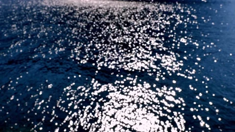 Unfocused Sun Reflection on Surface on Lake Lugano Stock Footage 191940864