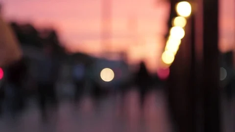 Unfocused twilight, walking pairs through alley in city Stock Footage 77514905