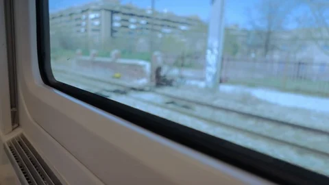 Unfocused view from the window of a moving train Stock Footage 104657061