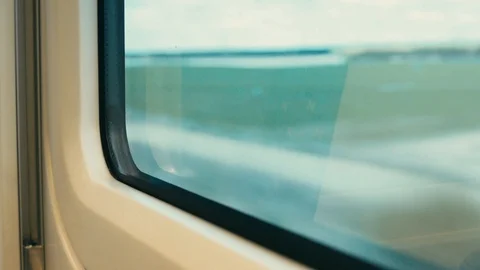 Unfocused view from the window of a moving train 스톡 동영상 104657073