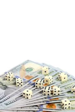 An unfolded stack of hundred-dollar bills and scattered cubes 写真素材