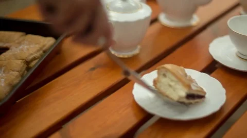 Unfolding cake on plates Stock Footage 72212401