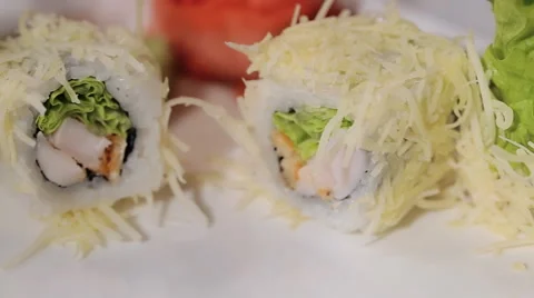 Unfolding sushi rolls on a plate. cheese, shrimp and rice, hand craftsmen work Stock Footage 59357041