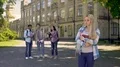 Unfriendly classmates making fun and mocking with sad lonely nerd girl, school 4k or 4k+ Resolution