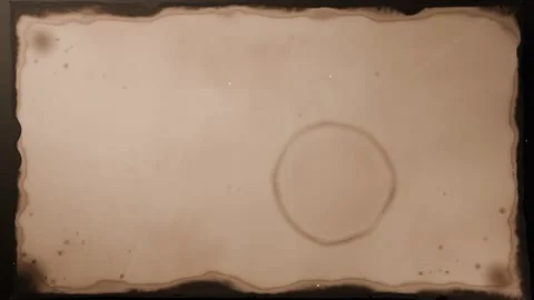 Unfurling scroll revealing aged parchment surface on dark backdrop, showing ring Stock Footage 340268257