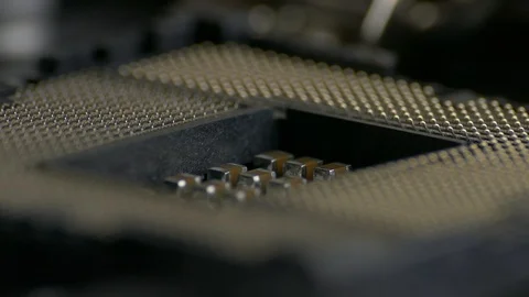 Ungraded: Intel Processor Is Installed in Computer Motherboard CPU Socket by Stock Footage 105622938