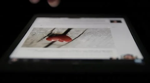 Ungraded: Internet Browsing on Tablet Computer Stock Footage 58263111