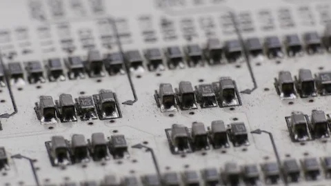 Ungraded: Rotating White Printed Circuit Board, Microprocessors, Capacitors and Video stock 80900366