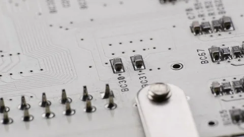Ungraded: Rotating White Printed Circuit Board, Microprocessors, Capacitors and Video stock 106928053