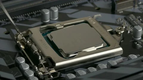 Ungraded: Six-Core Intel Core I7 8700K Processor Removed From Computer Stock Footage 157301121