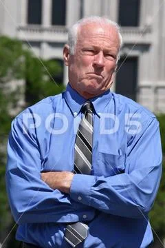 Unhappy Adult Senior Person Wearing Tie Stock Photos