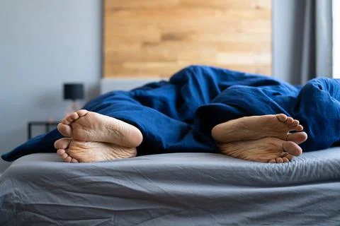 Unhappy Angry Divorce Feet In Bedroom Stock Photos