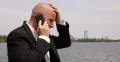 Unhappy Business Man Talking Mobile Phone Call Bad News Talk Cellphone Park Lake 4k or 4k+ Resolution
