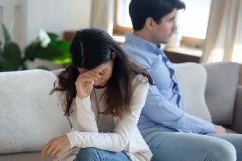 Unhappy couple avoid talking after family fight Foto stock