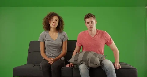 Unhappy couple having therapy for relationship problems on green screen Stock Footage