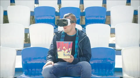 Unhappy guy in VR glasses Stock Footage 63840238