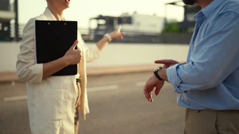 Unhappy male client gesturing angrily while arguing with female architect o.. Stock Footage 340562522