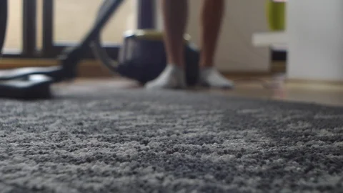 Unhappy Man Slowly Cleaning Up Using Vacuum Dust Cleaner, Hoover Stock Footage 90129177