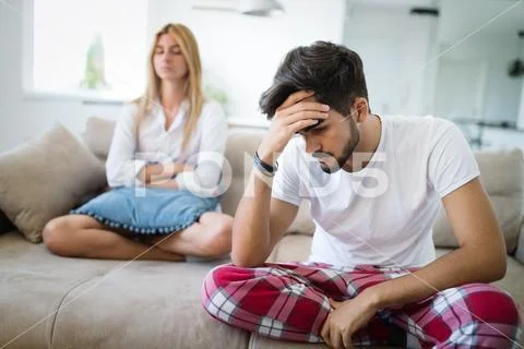 Unhappy married couple on verge of divorce due to impotence Stock Photos