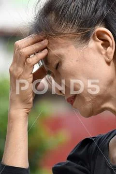 Unhappy Retired Female Senior Stock Photos
