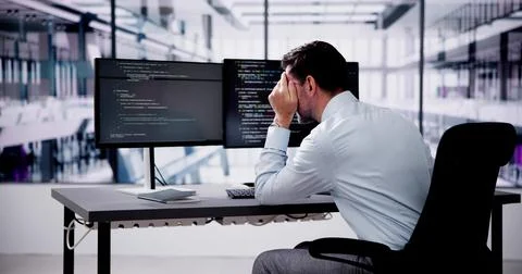 Unhappy Sad Developer Programmer Man In Stress Coding Software Stock Photos
