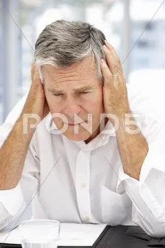 Unhappy senior businessman Stock Photos