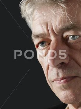 Unhappy Senior Man Looking Away Stock Photos