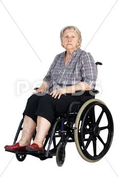 Unhappy senior woman in wheelchair Stock Photos