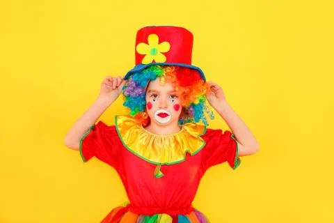Unhappy tired little clown looking at camera Stock Photos