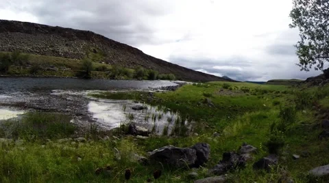 Unhurried Flow of Mongolian Mountain River in The Midst of a Vast Steppe Stock Footage 59717858