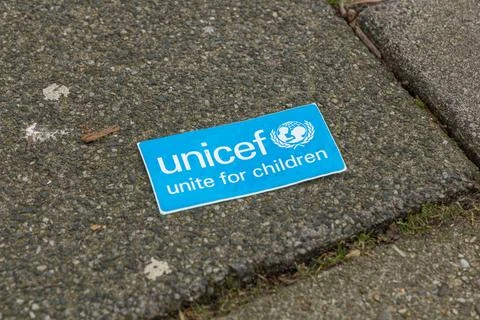 Unicef logo sticker stone floor Stock Photos
